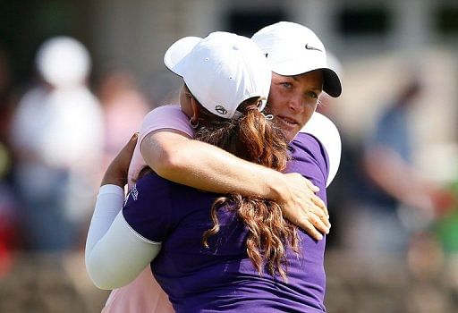 Suzann Pettersen hugs Lizette Salas after the Norway star won their playoff on April 20, 2013 in Hawaii