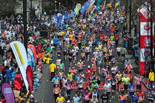 Runners take part in the 2013 London Marathon in London on April 21, 2013
