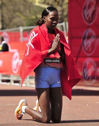 Priscah Jeptoo of Kenya reacts after winning the women&#039;s race in central London on April 21, 2013