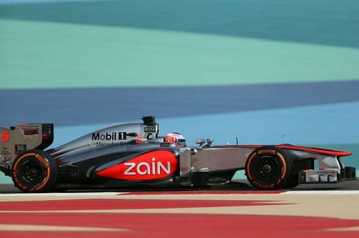 Jenson Button drives at the Bahrain International Circuit in Manama on April 21, 2013