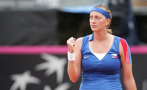 Czech Republic's Petra Kvitova reacts after defeating Italy's Sara Errani on April 21, 2013, in Palermo