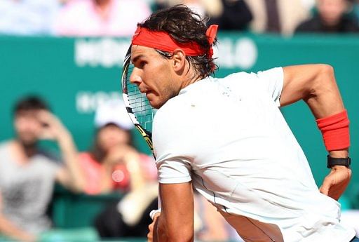 Rafael Nadal runs after the ball during the Monte Carlo Masters final against Serbia&#039;s Novak Djokovic, on April 21, 2013