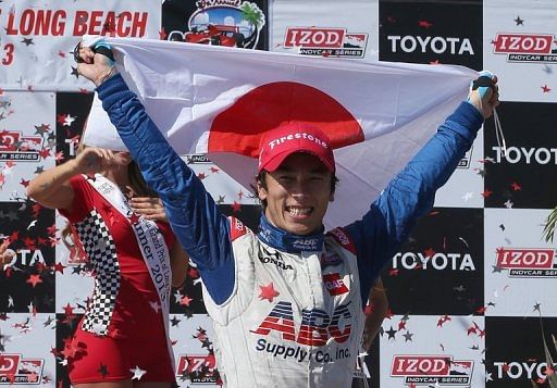 Takuma Sato celebrates after winning the IndyCar Series Toyota Grand Prix of Long Beach on April 21, 2013 in California