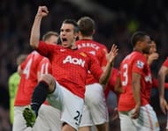 Manchester United's Dutch striker Robin van Persie celebrates scoring his team's first goal on April 22, 2013