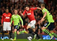 Manchester United's Dutch striker Robin van Persie (2nd R), at Old Trafford in Manchester, England, on April 22, 2013
