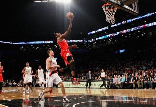 Luol Deng of the Chicago Bulls goes up against the Brooklyn Nets on April 22, 2013