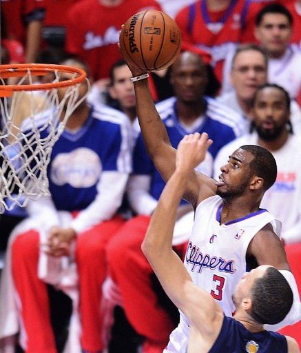 Chris Paul of the Los Angeles Clippers dunks before Tayshaun Prince of the Memphis Grizzlies on April 22, 2013