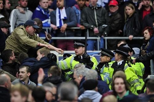 Millwall fans clash with police during the FA Cup semi-final against Wigan at Wembley Stadium on April 13, 2013 Millwall fans clash with police during the FA Cup semi-final against Wigan at Wembley Stadium on April 13, 2013