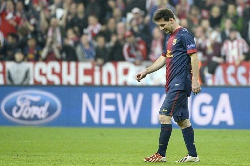 Barcelona&#039;s Lionel Messi trudges off after defeat in the UEFA Champions League on April 23, 2013