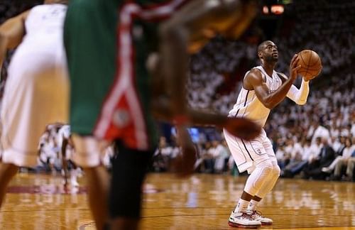 Miami Heat's Dwyane Wade shoots a free throw during their game against the Milwaukee Bucks in Florida on April 23, 2013