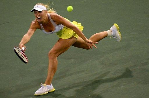 Caroline Wozniacki of Denmark runs down a return on March 15, 2013 in Indian Wells, California