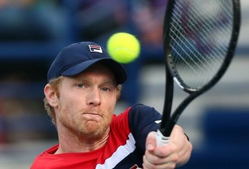 Russia's Dmitry Tursunov hits a return on February 28, 2013 in Dubai