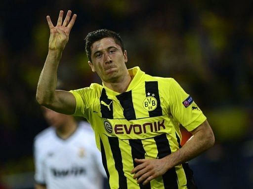 Lewandowski hits four as Dortmund rout Real