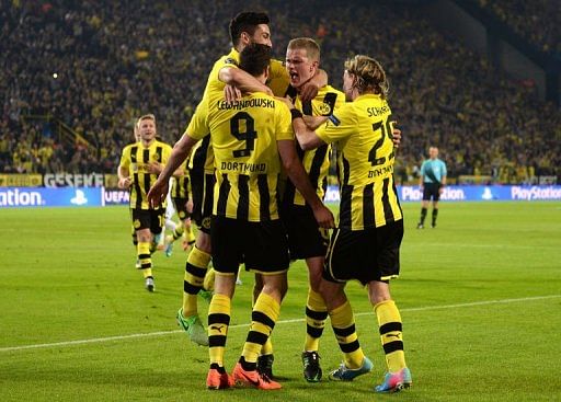 Dortmund&#039;s players celebrate on April 24, 2013 in Dortmund