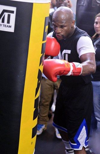Boxer Floyd Mayweather Jr. works out at the Mayweather Boxing Club on April 17, 2013 in Las Vegas, Nevada