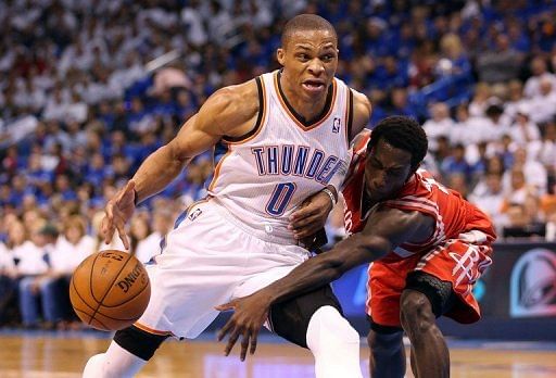The Thunder&#039;s Russell Westbrook (L) is guarded by Houston Rockets&#039; Patrick Beverley during their game on April 24, 2013