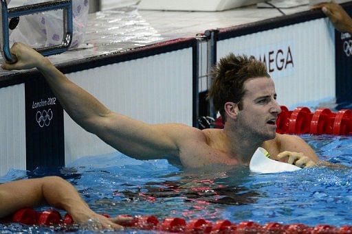 Australia&#039;s James Magnussen checks the scoreboard after competing at the London Olympics on August 2, 2012