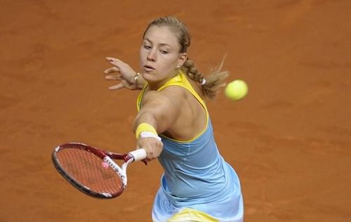 Germany Angelique Kerber returns the ball to Russia's Anastasia Pavlyuchenkova in Stuttgart, April 25, 2013