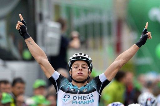 Belgium&#039;s Gianni Meersman celebrates winning the third stage of the Tour de Romandie cycling race on April 26, 2013