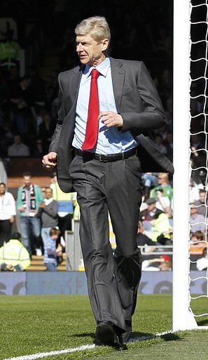 Arsenal manager Arsene Wenger prior to the second half of the match against Fulham on April 20, 2013