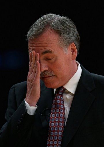 Lakers head coach Mike D'Antoni can hardly watch, as his side lost to the San Antonio Spurs on April 26, 2013