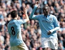 Aguero, Toure soothe Man City's title pain