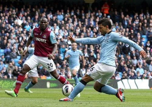 Manchester City's Sergio Aguero shoots at West Ham's goal in Manchester on April 27, 2013 Manchester City's Sergio Aguero shoots at West Ham's goal in Manchester on April 27, 2013