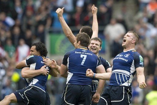 Leinster players celebrate after their victory in the European Cup final rugby union match in London on May 19, 2012