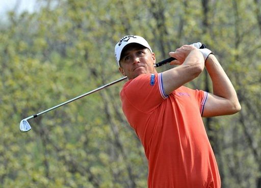 Alexander Noren of Sweden tees off at the 6th hole during the Ballantine&#039;s Championship in Icheon, April 27, 2013