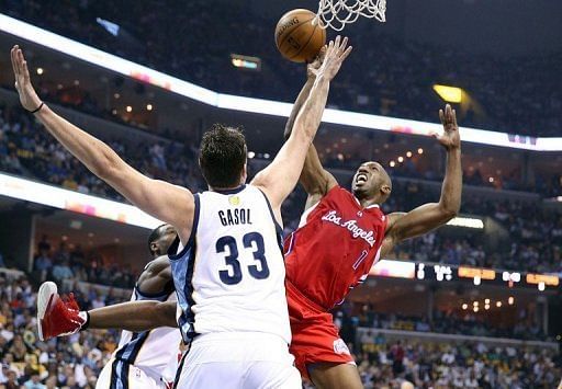 Chauncey Billups (R) of the LA Clippers shoots while defended by Marc Gasol of the Memphis Grizzlies, April 27, 2013