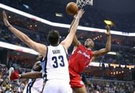 Chauncey Billups (R) of the LA Clippers shoots while defended by Marc Gasol of the Memphis Grizzlies, April 27, 2013
