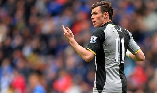 Tottenham winger Gareth Bale makes his point to the assistant referee during the match against Wigan on April 27, 2013