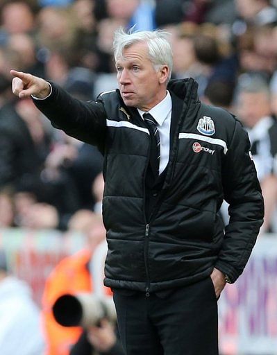 Newcastle United manager Alan Pardew gestures to his men during the 6-0 home defeat to Liverpool on April 27, 2013