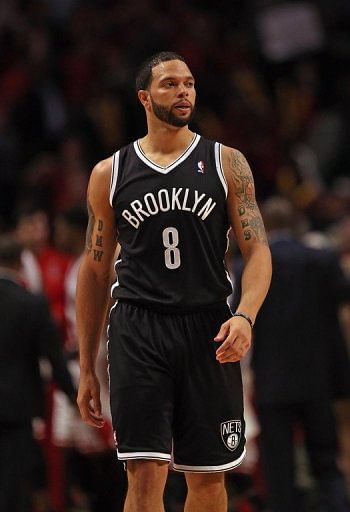 Deron Williams of the Brooklyn Nets walks off court after a loss to the Chicago Bulls on April 25, 2013