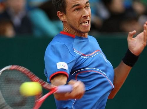 Czech Republic's Lukas Rosol returns a shot during a Davis Cup match in the Kazakh capital Astana, on April 7, 2013