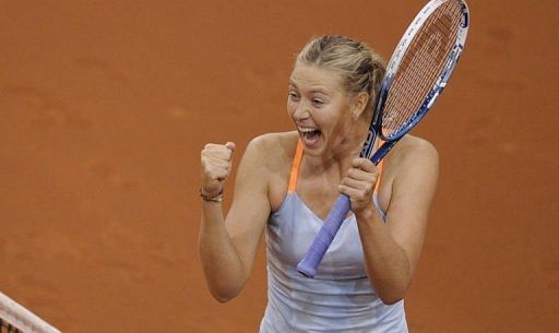 Russia&#039;s Maria Sharapova reacts after beating China&#039;s Li Na in Stuttgart on April 28, 2013