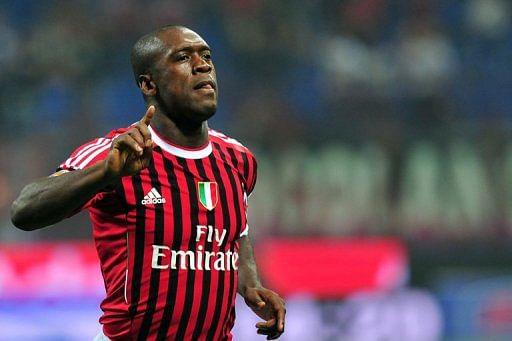 AC Milan&#039;s Clarence Seedorf celebrates after scoring against Cesena at the San Siro in Milan on September 24, 2011