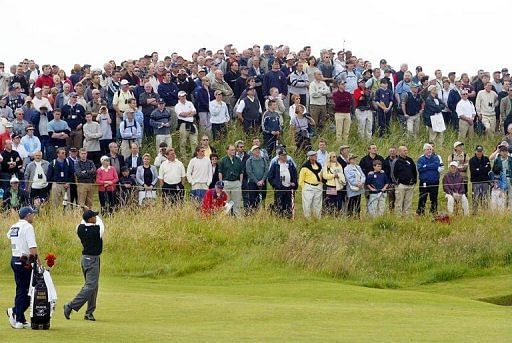 Tiger Woods hits a shot in the first round at the 131st Open Championship at Muirfield, Scotland on July 18, 2002