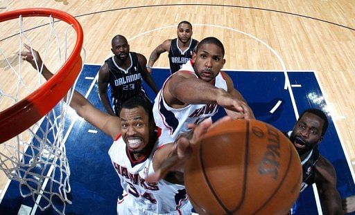 Jason Collins (L), playing for the Atlanta Hawks, is pictured during a game in Atlanta, Georgia on April 28, 2011
