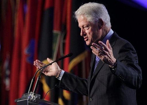 Former US president Bill Clinton is pictured during a speech in Washington, DC on April 29, 2013