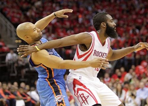 Houston Rockets' James Harden (R) and Oklahoma City's Derek Fisher are pictured during their game on April 29, 2013