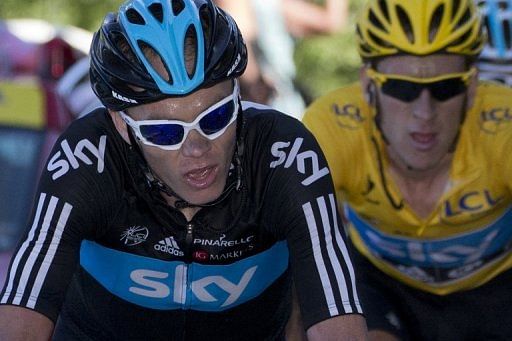 Britain&#039;s Chris Froome (left) and Bradley Wiggins ride in the 11th stage of the 2012 Tour de France, on July 12, 2012.