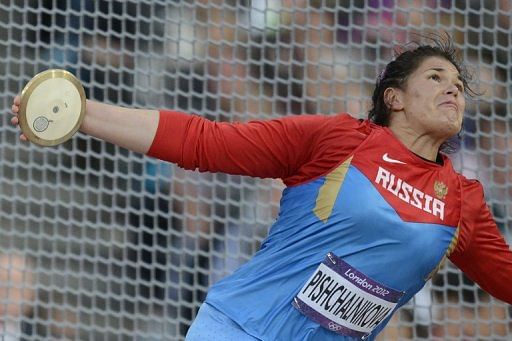 Russian discus thrower Daria Pishchalnikova competes at the 2012 London Olympic Games, on August 4, 2012