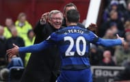 STOKE ON TRENT, ENGLAND - APRIL 14: Robin van Persie of Manchester United celebrates scoring their second goal with manager Sir Alex Ferguson