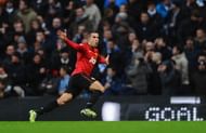 MANCHESTER, ENGLAND - DECEMBER 09: Robin van Persie of Manchester United celebrates scoring the winning goal during the Barclays Premier League match between Manchester City and Manchester United at the Etihad Stadium
