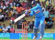 Indian cricketer Virender Sehwag plays a