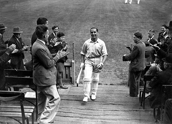 16th June 1932, Percy Holmes and Herbert Sutcliffe broke world record cricket partnership with a score of 555 for their Yorkshire team in a match versus Essex at Leyton, London, Herbert Sutcliffe returns to the pavilion after the record innings