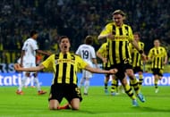 Robert Lewandowski of Borussia Dortmund celebrates after scoring his team's third goal during the UEFA Champions League semi final first leg match between Borussia Dortmund and Real Madrid at Signal Iduna Park on April 24, 2013 in Dortmund, Germany. (Photo by Lars Baron/Bongarts/Getty Images)
