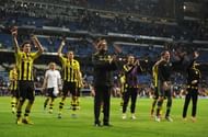Head Coach Jurgen Klopp of Borussia Dortmund celebrates with players as his team reach the final after the UEFA Champions League Semi Final Second Leg match between Real Madrid and Borussia Dortmund at Estadio Santiago Bernabeu on April 30, 2013 in Madrid, Spain.