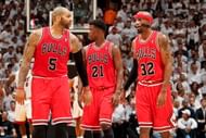 Carlos Boozer #5, Jimmy Butler #21 and Richard Hamilton #32 of the Chicago Bulls wait to resume play against the Miami Heat in Game Five of the Eastern Conference Semifinals during the 2013 NBA Playoffs on May 15, 2013 at American Airlines Arena in Miami, Florida. (Getty Images)